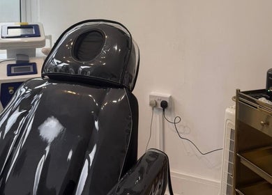 Relaxing black spa chair at Enhanced by Georgia in Tiptree, England, GB, offering a luxurious wellness experience.
