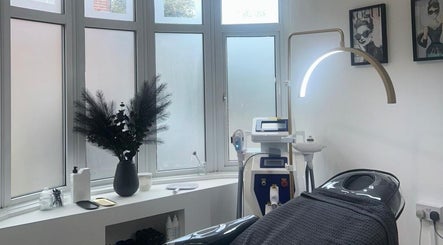 Modern spa room at Enhanced by Georgia, Tiptree, England, GB, featuring sleek equipment and soothing decor.