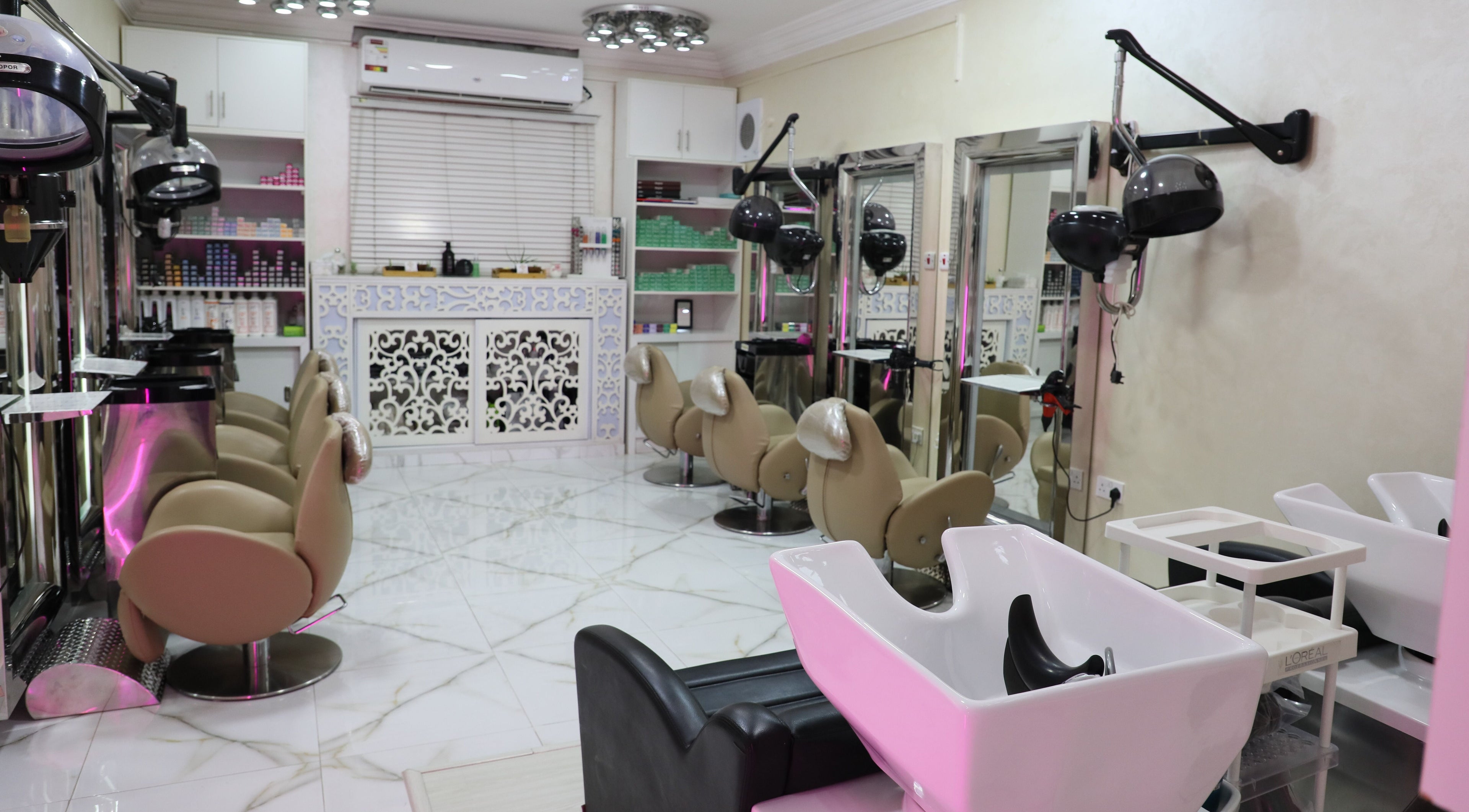 Modern salon inside Lamsat Magribyah Beauty Center, Doha, Al Rayyan Municipality, QA, with stylish seating.