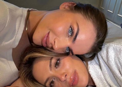 Two women smiling at SADE Aesthetics London, London, England, GB.