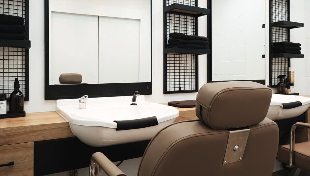 Chic styling chair and mirror setup at Sassy Aesthetics London LTD, London, England, GB.