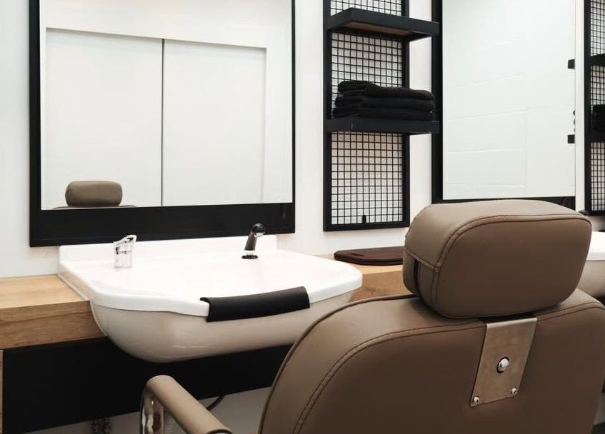 Chic styling chair and mirror setup at Sassy Aesthetics London LTD, London, England, GB.