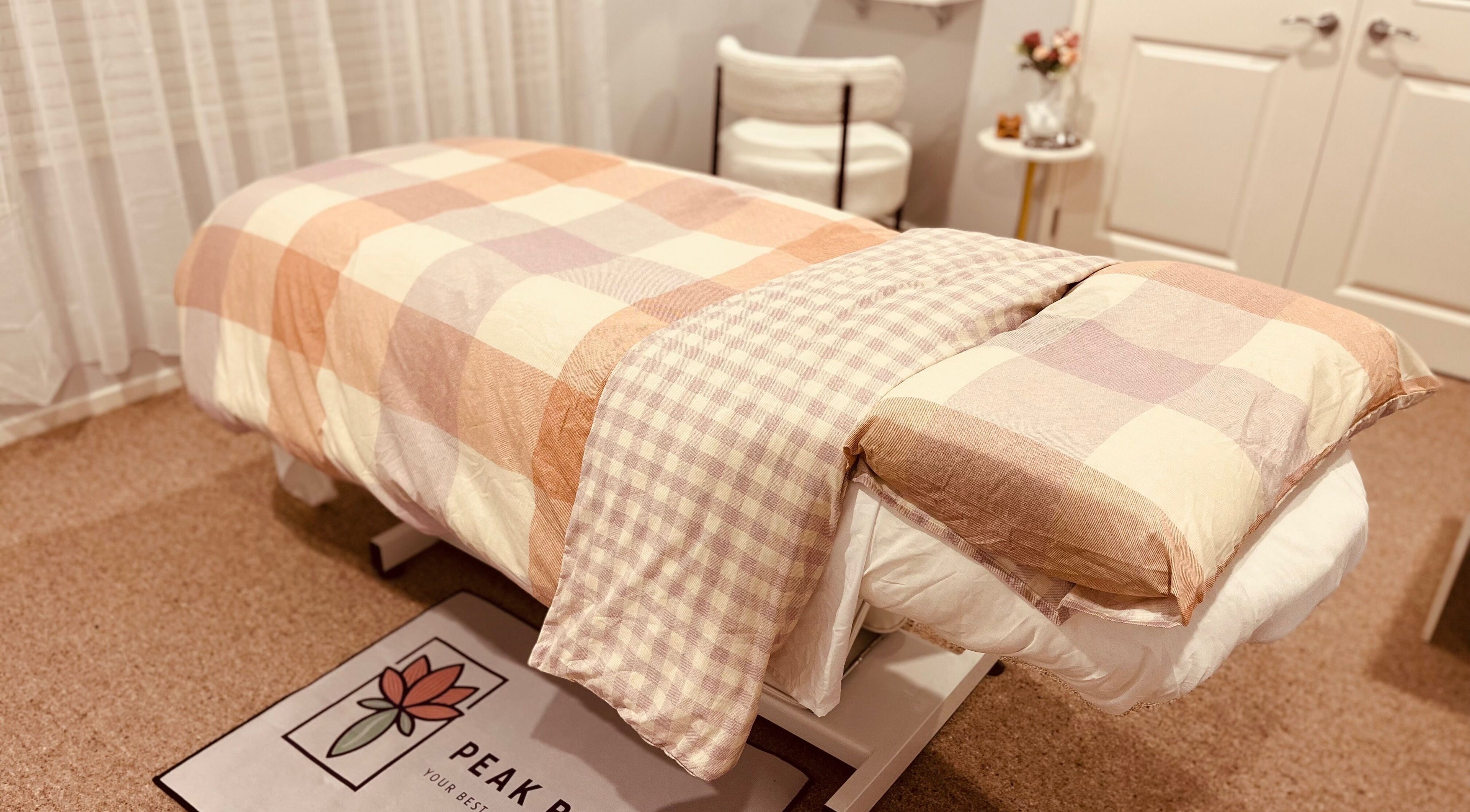 Comfortable massage bed at Peak Beauty, Katikati, Bay Of Plenty Region, NZ for ultimate relaxation.