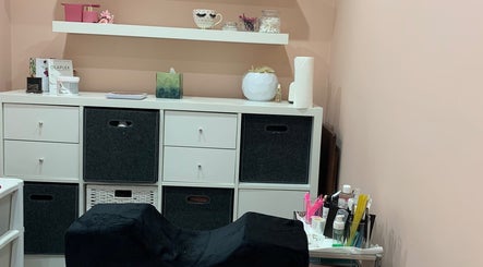 Cozy beauty setup at Aura beauty - Norbury, London, England, GB with shelves and wellness products.