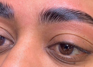 Close-up of perfectly shaped eyebrows at Aura beauty - Norbury in London, England, GB.