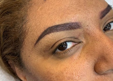 Close-up of perfectly shaped eyebrows at Aura beauty - Norbury, London, England, GB.