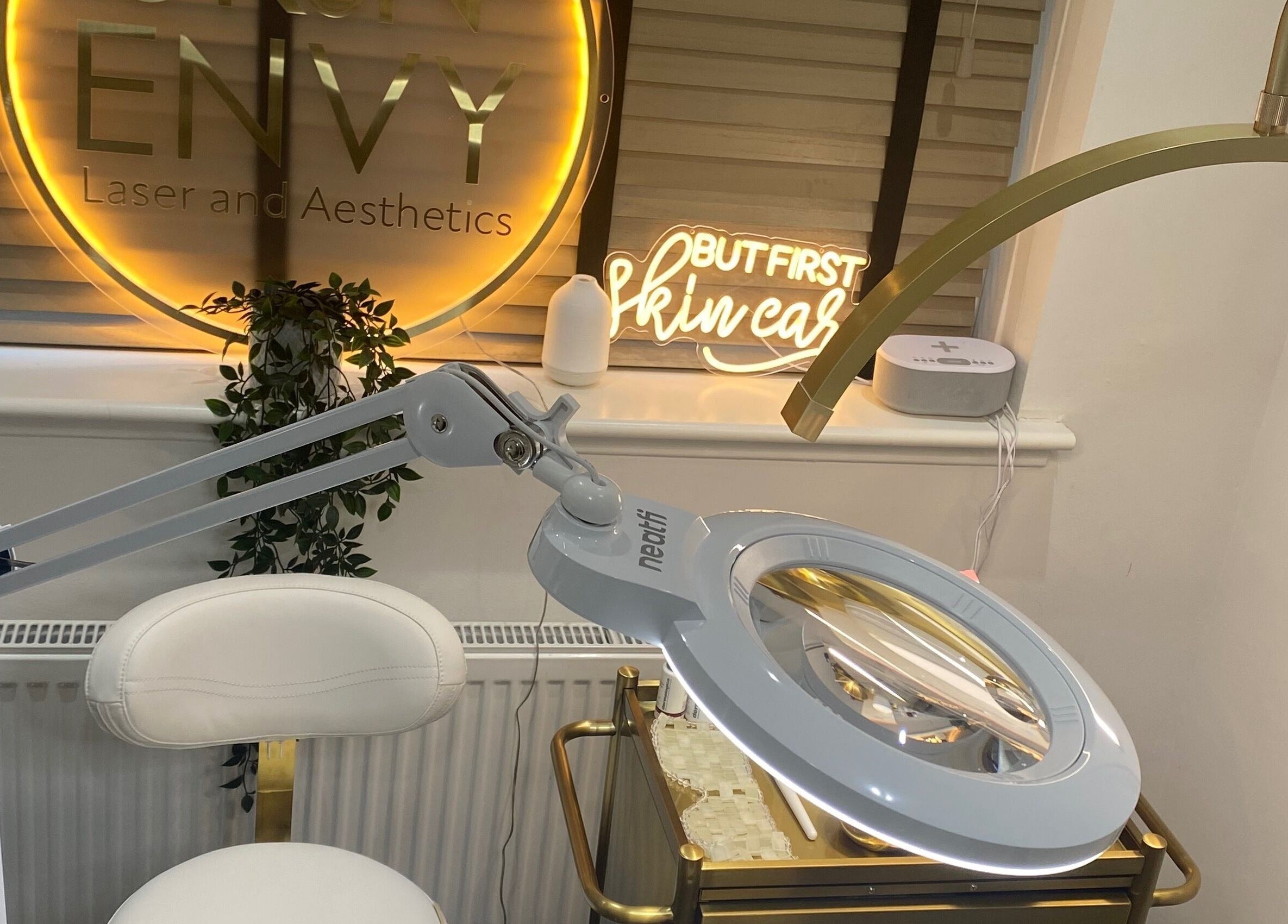 Treatment room at Skin Envy Laser and Aesthetics Ltd in Birmingham, England, GB with skincare tools and elegant decor.