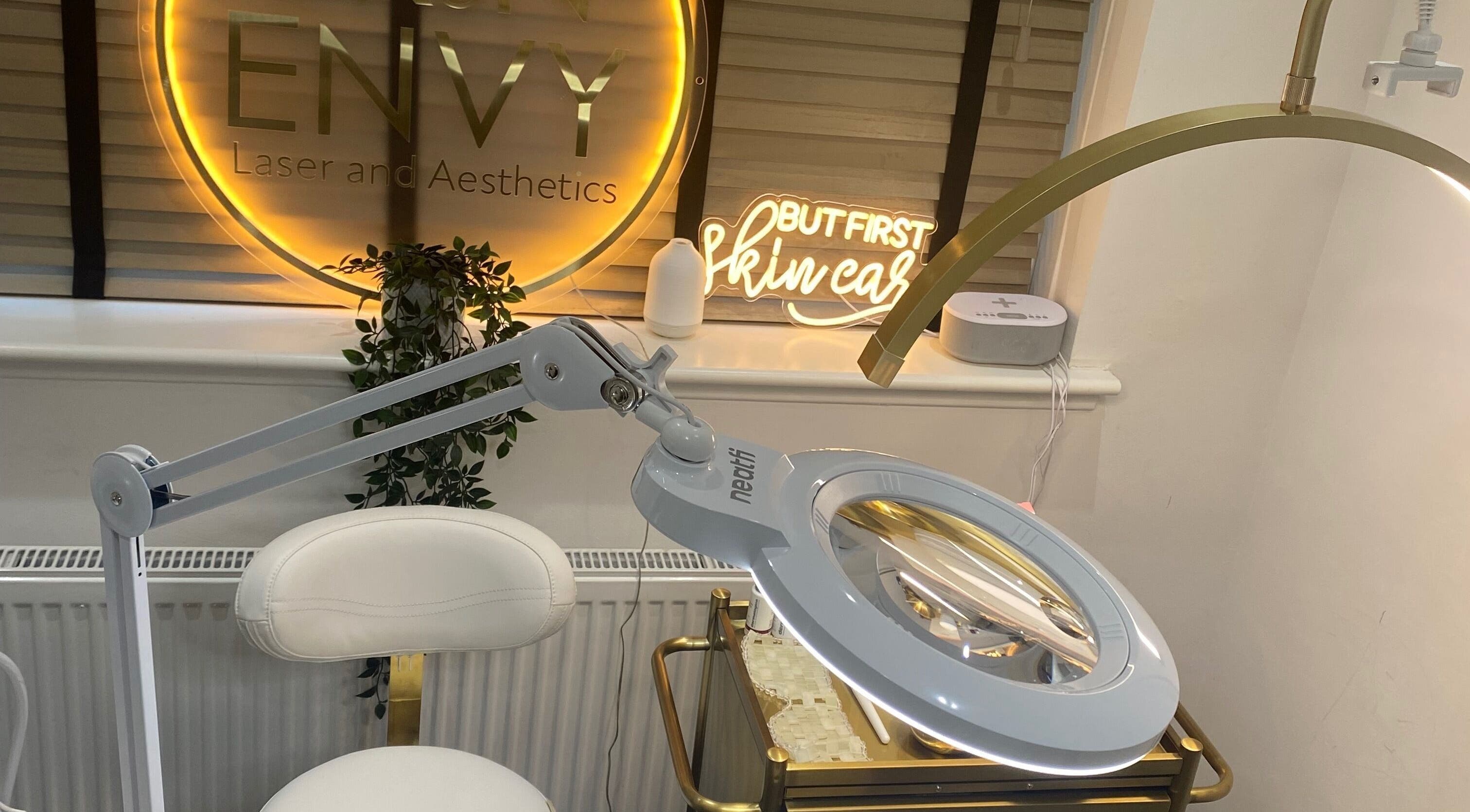 Treatment room at Skin Envy Laser and Aesthetics Ltd in Birmingham, England, GB with skincare tools and elegant decor.