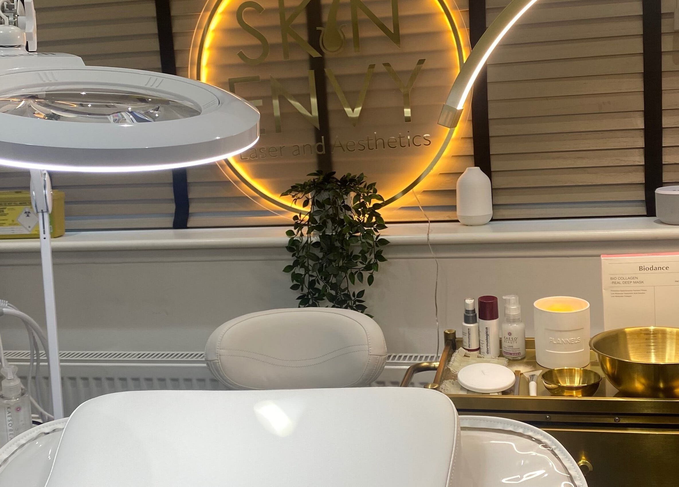 Modern treatment room at Skin Envy Laser and Aesthetics Ltd, Birmingham, England, GB with elegant decor.