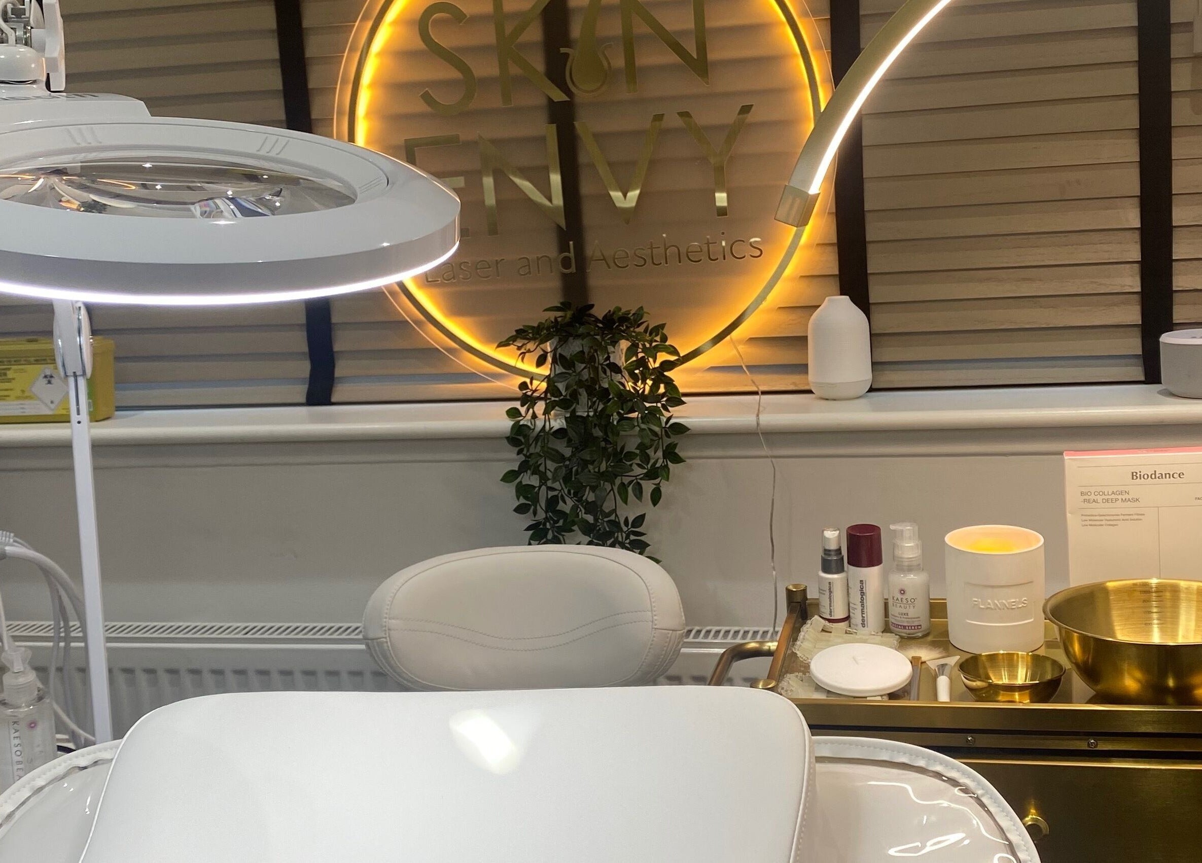Modern treatment room at Skin Envy Laser and Aesthetics Ltd, Birmingham, England, GB with elegant decor.