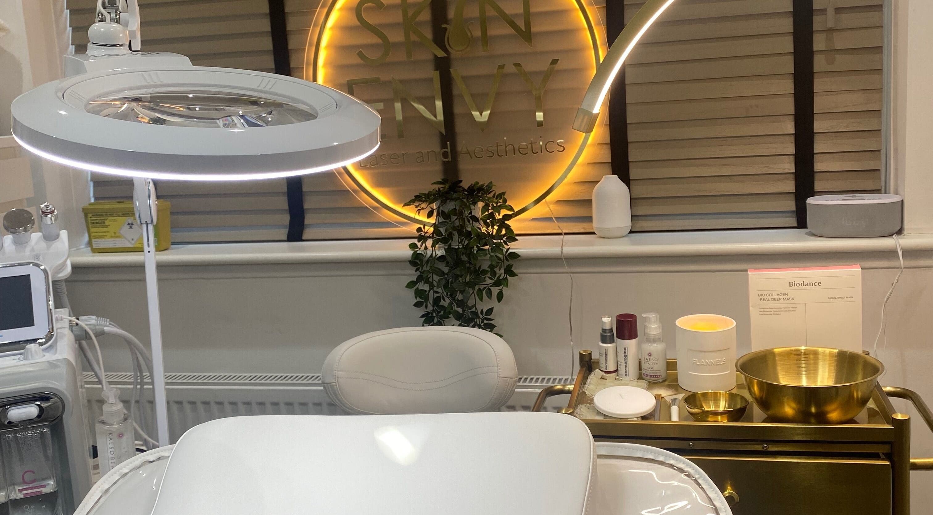 Modern treatment room at Skin Envy Laser and Aesthetics Ltd, Birmingham, England, GB with elegant decor.