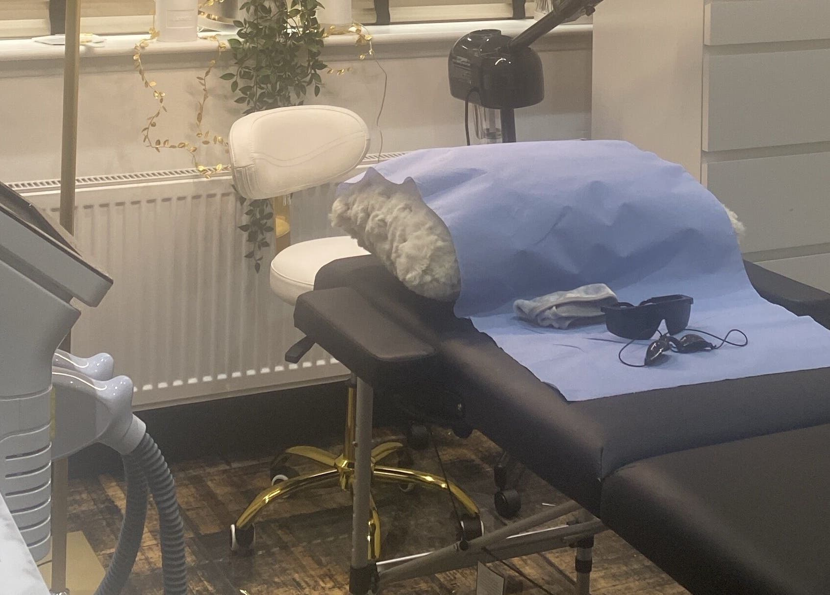 Treatment room at Skin Envy Laser and Aesthetics Ltd in Birmingham, England. Equipped with modern beauty tools.