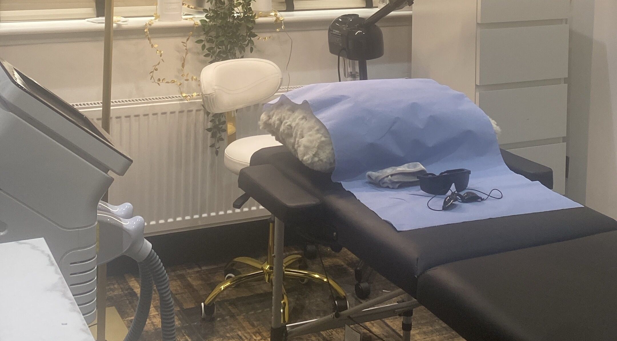 Treatment room at Skin Envy Laser and Aesthetics Ltd in Birmingham, England. Equipped with modern beauty tools.