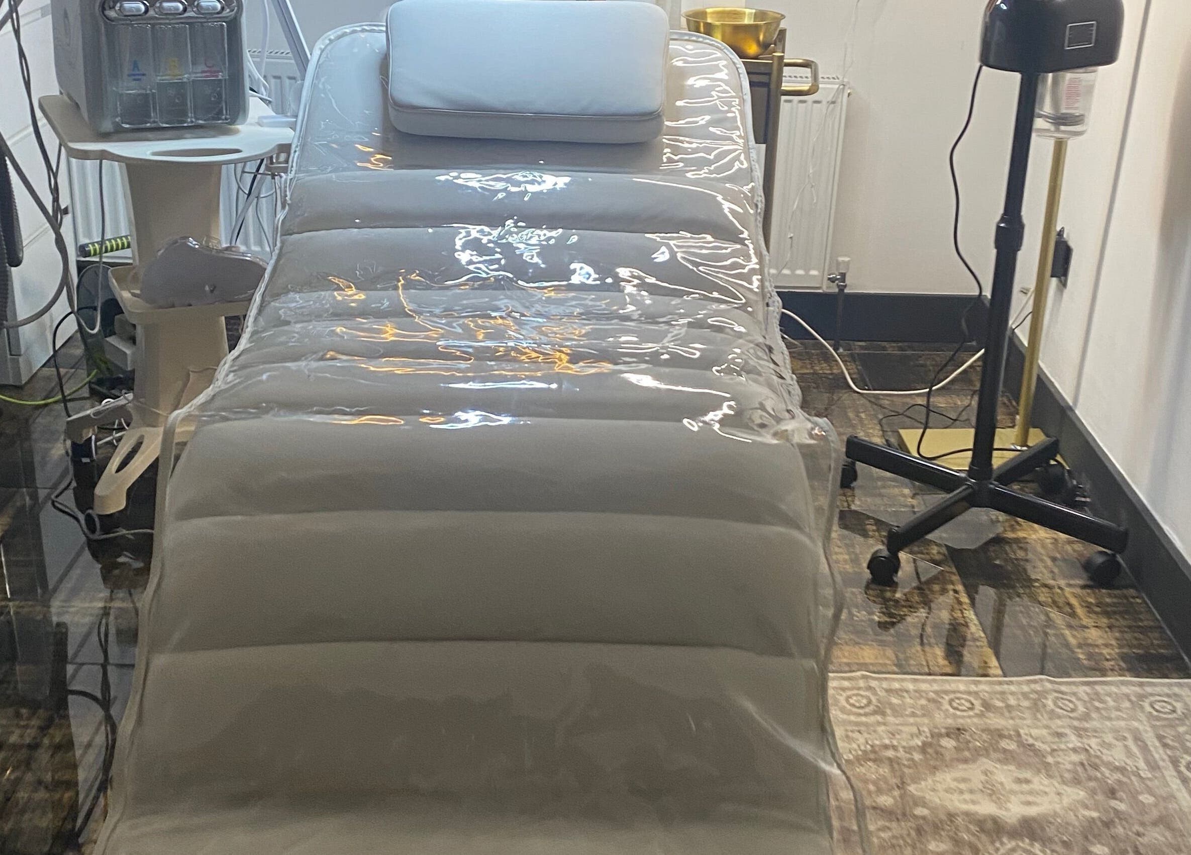 Luxury treatment bed at Skin Envy Laser and Aesthetics Ltd, Birmingham, England, GB, enhancing wellness in style.