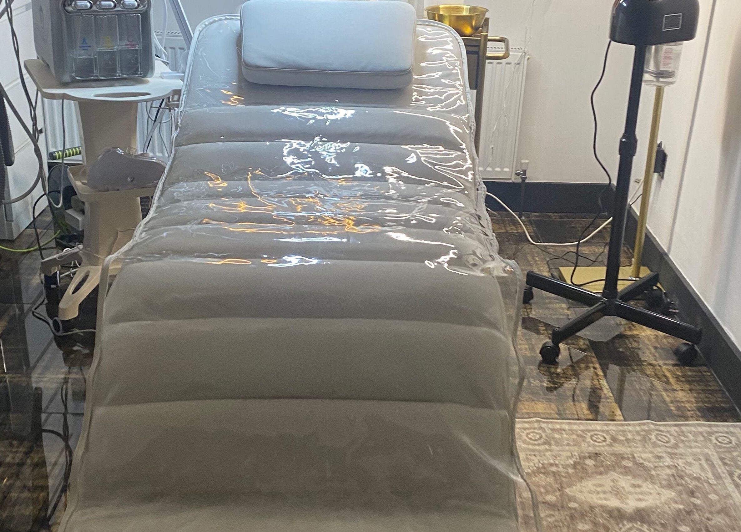 Luxury treatment bed at Skin Envy Laser and Aesthetics Ltd, Birmingham, England, GB, enhancing wellness in style.