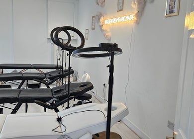 Modern beauty treatment room at The Sublime Curve of Beauty, Stockport, England, GB with sleek equipment.
