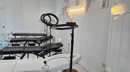 Modern beauty treatment room at The Sublime Curve of Beauty, Stockport, England, GB with sleek equipment.
