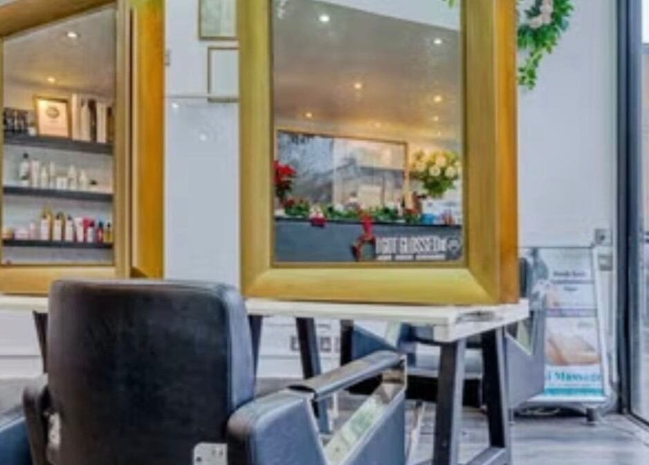 Ursulabeauty.Co salon interior with stylish mirrors and chairs in London, England, GB.