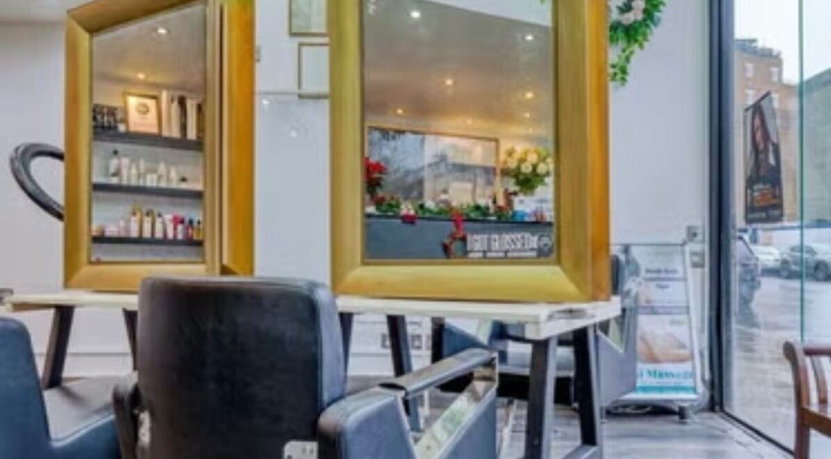 Ursulabeauty.Co salon interior with stylish mirrors and chairs in London, England, GB.