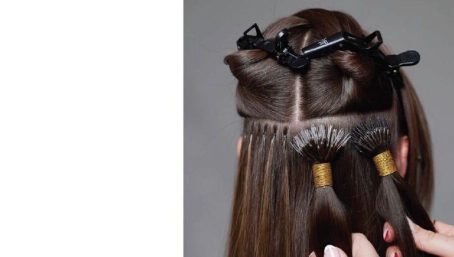 Hair extension application at Hair Spray Home Service - Jeddah, showcasing quality styling in Jeddah, Makkah Province, SA.