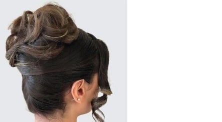 Chic updo hairstyle from Hair Spray Home Service - Jeddah, Makkah Province, SA.