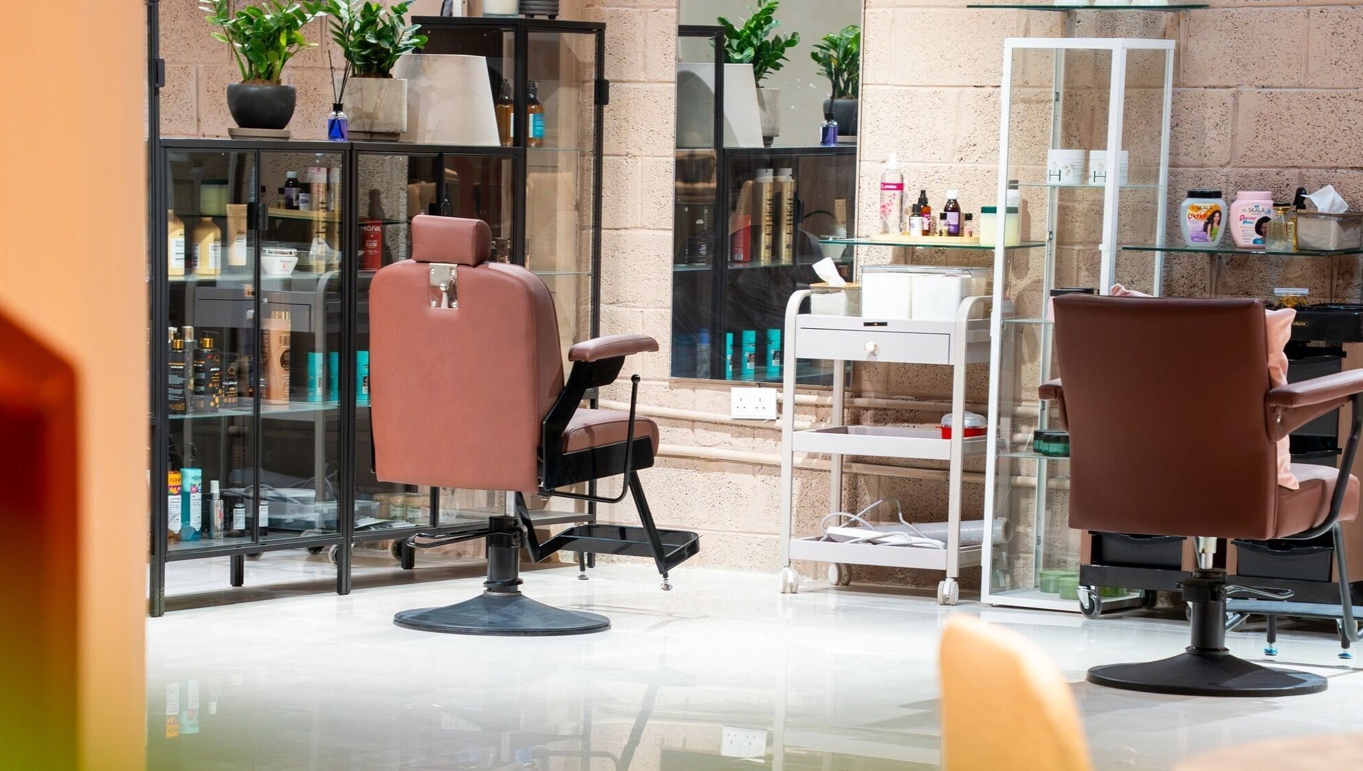 Elegant salon interior with chairs at Markaz Al Funoon, Riyadh, Riyadh Province, SA, inviting relaxation and care.
