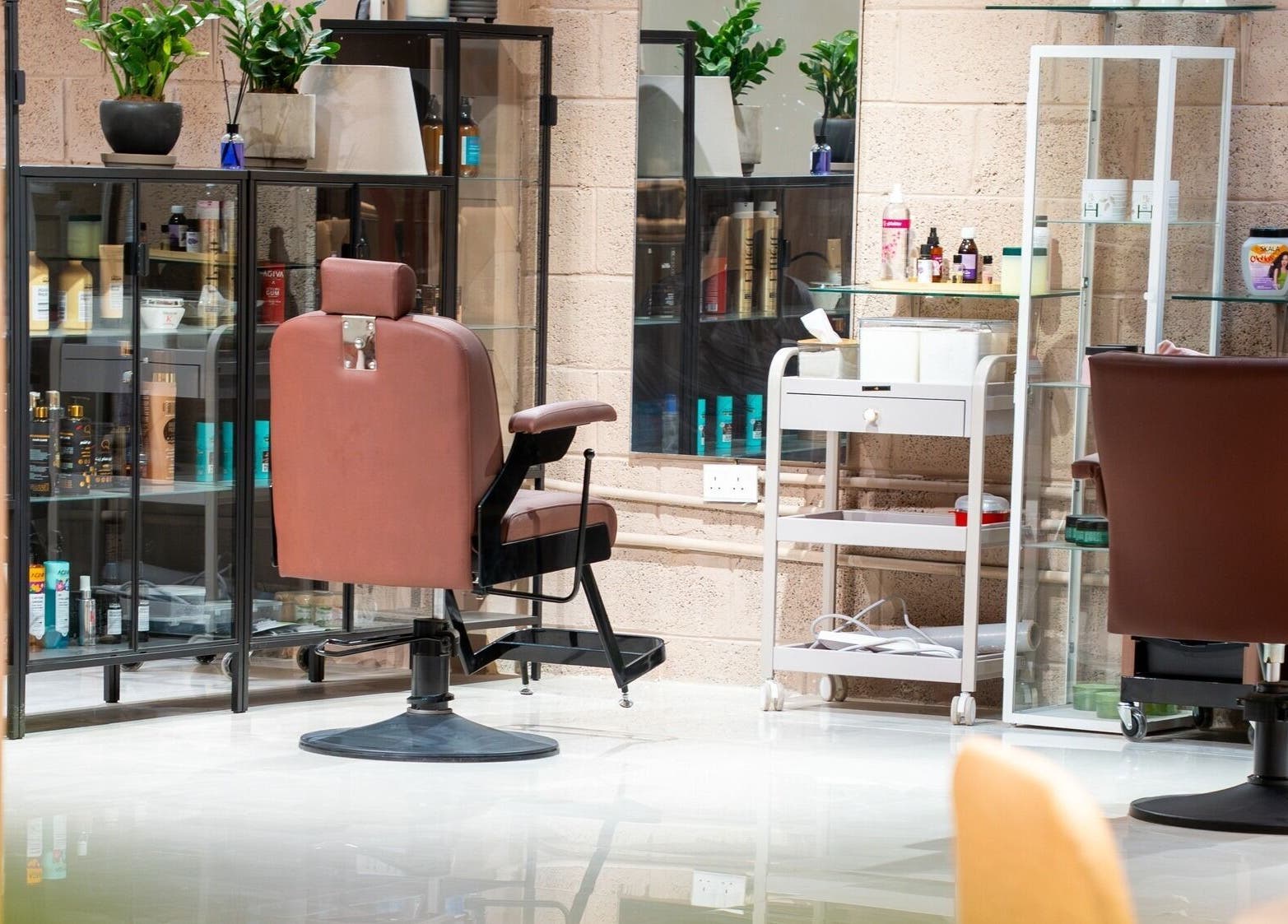 Elegant salon interior with chairs at Markaz Al Funoon, Riyadh, Riyadh Province, SA, inviting relaxation and care.