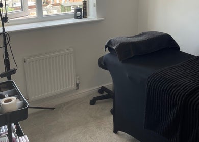 Taylor Made Cosmeticsuk spa room in Mirfield, England, GB featuring a cozy treatment bed and professional tools.