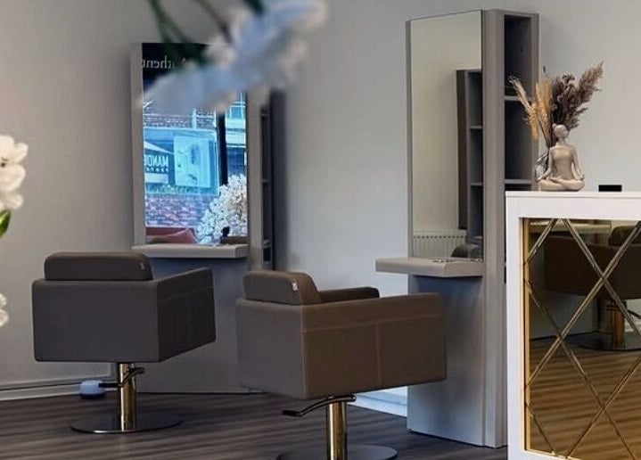 Modern salon interior at The House Of Calm, South Shields, England, GB featuring sleek chairs and calming decor.