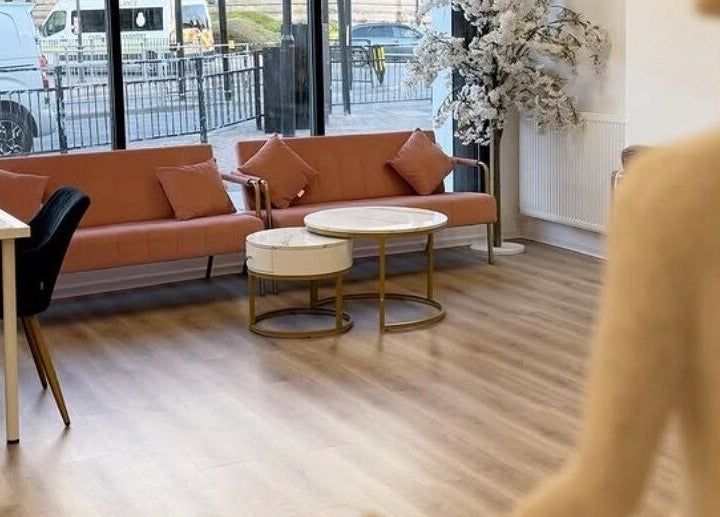 Elegant seating area at The House Of Calm, South Shields, England, GB, featuring stylish sofas and decor.