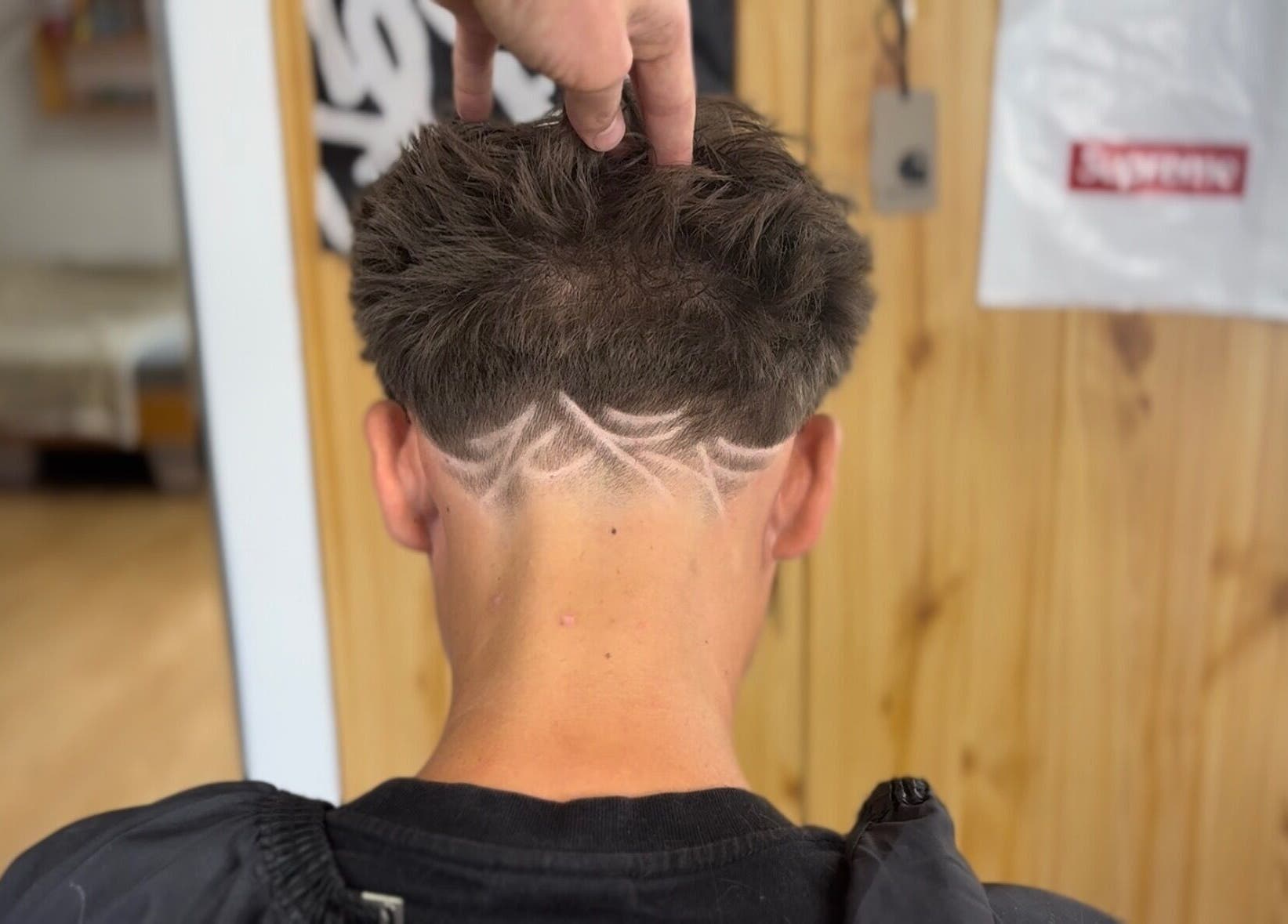 Creative undercut hair design at TomasCutzz_ in Český Krumlov, Jihočeský Kraj, CZ.