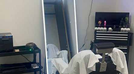 Level Up Barbershop in Manchester, England, GB features a sleek, modern grooming station with professional tools.