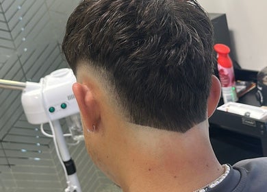 Fresh undercut at Level Up Barbershop, Manchester, England, GB, showcasing modern men's hairstyle.