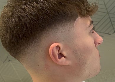 Close-up of a trendy fade haircut at Level Up Barbershop, Manchester, England, GB.