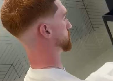 Stylish fade haircut at Level Up Barbershop, located in Manchester, England, GB.