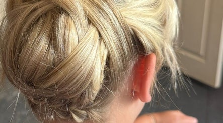 Elegant braided updo hairstyle at PureGold Beauty, Skelton-in-Cleveland, England, GB.