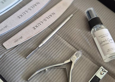 Manicure tools and sanitizer spray at BROMÉ STUDIO, Garforth, England, GB, showcasing professional beauty services.