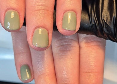 Elegant sage green manicure at BROMÉ Studio - Mobile, Garforth, England, GB showcases polished nails.