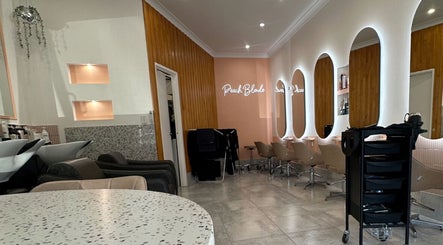 Modern salon interior at LYS THE STUDIO, Gold Coast, Queensland, AU with stylish chairs and lighted mirrors.