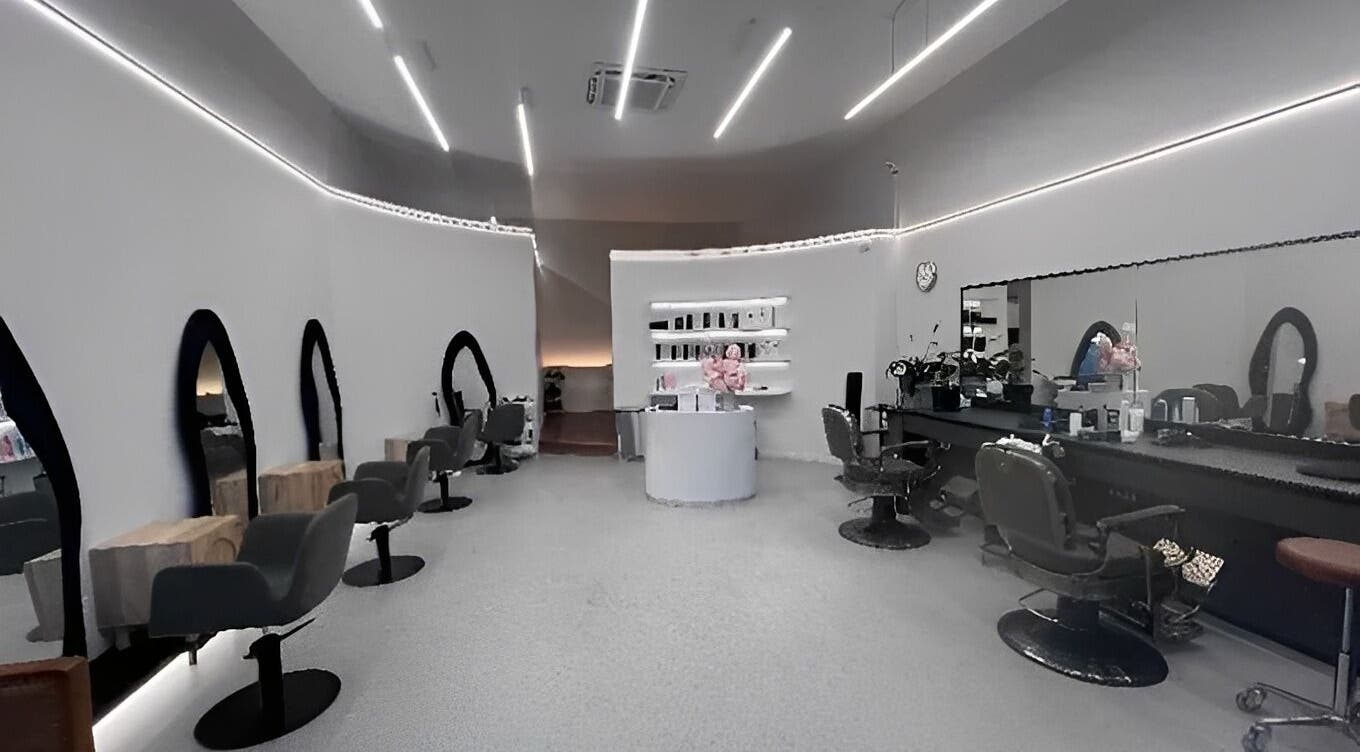 Stylish interior of Sharpcraft hair salon in Upper Mount Gravatt, Queensland, AU with modern styling stations.