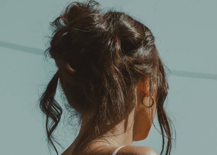 Sophisticated updo hairstyle at Cloe. Hair Studio, Woolgoolga, New South Wales, AU. Perfect for any occasion.