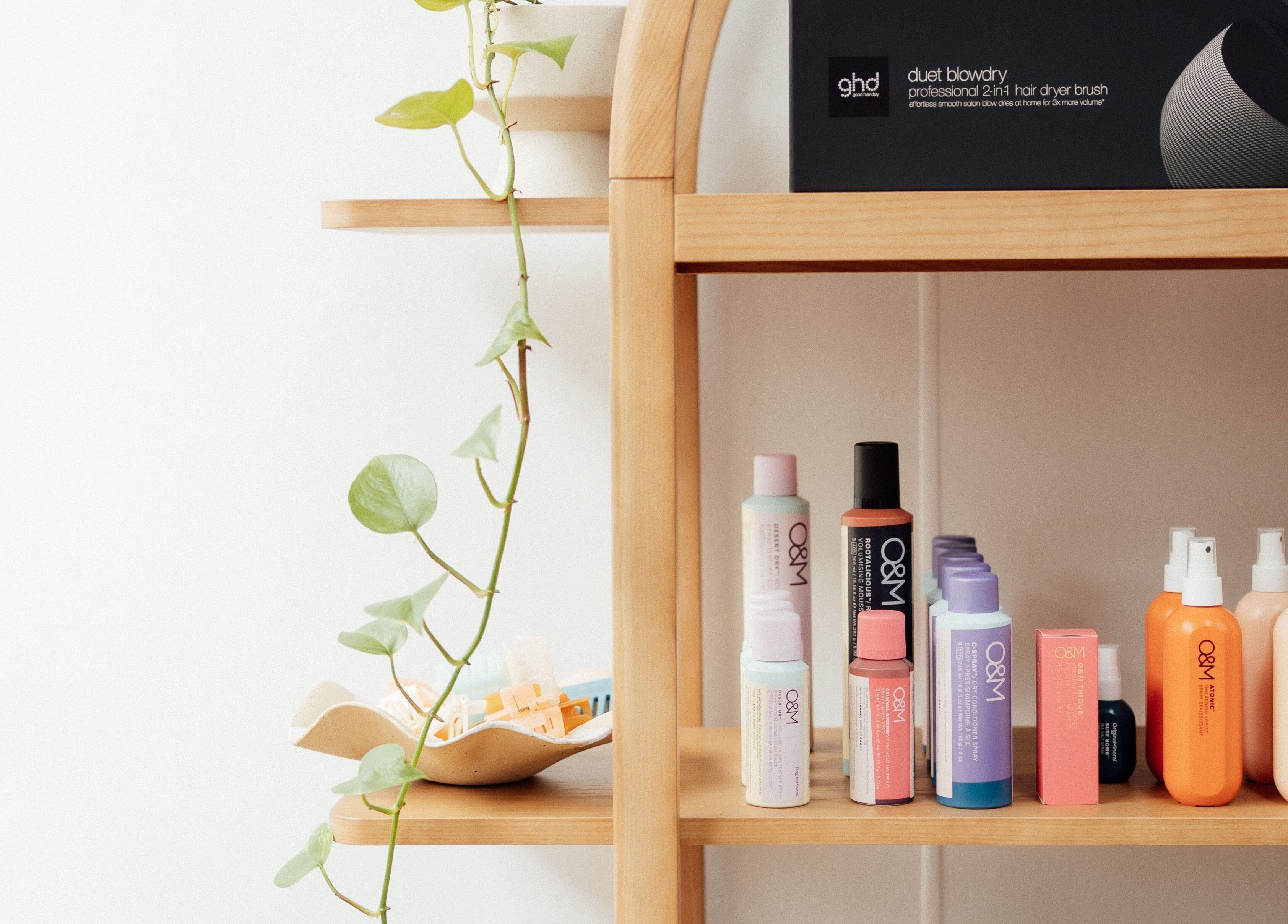 Cloe. Hair Studio's product display at Woolgoolga, New South Wales, AU featuring O&M hair care.