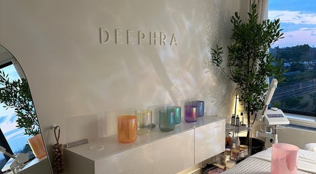 Relaxing spa ambiance at Deephra, New York, New York, US, with colorful candle holders and serene decor.