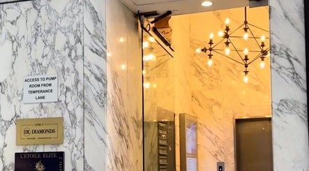 Marble entrance with chandelier at Q Nails & Design Sydney, Sydney, New South Wales, AU.