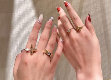 Beautifully designed nails with rings at Q Nails & Design Sydney, New South Wales, AU.