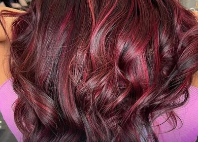 Elegant red hair waves styled at Leila Hair Studio, Newmarket, Ontario, CA.