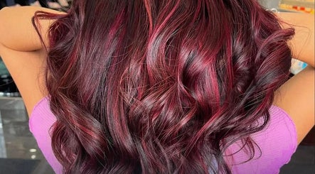Elegant red hair waves styled at Leila Hair Studio, Newmarket, Ontario, CA.