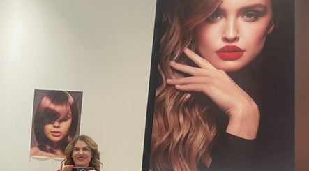 Modern hairstyle posters at Leila Hair Studio in Newmarket, Ontario, CA, showcasing elegant hair styling.