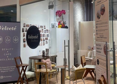 Chic entrance of Velveté Boutique in Singapore, SG showcasing beauty, wellness, and cafe services.