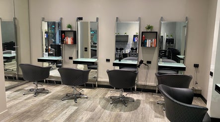 Elegant salon chairs at Vogue Hair&Beauty Salon, Melbourne, Victoria, AU, inviting for a luxurious experience.